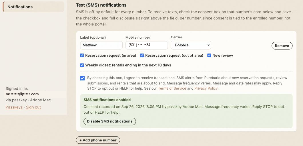Admin Notifications page after checking the consent box and selecting Enable SMS notifications, showing a green “SMS notifications enabled” confirmation with the consent timestamp and a redacted mobile number, plus a Disable SMS notifications button.